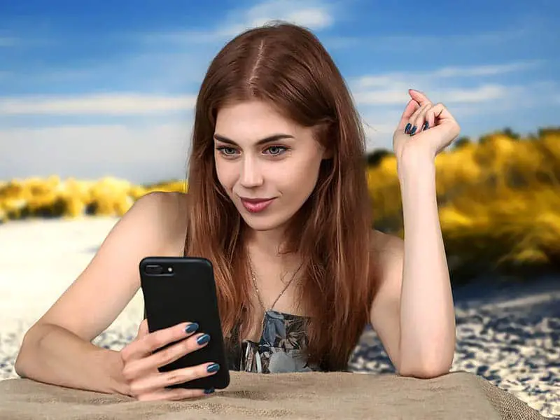 Girl with phone getting text impressed